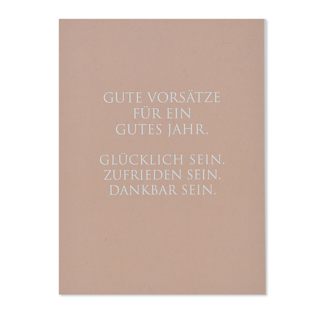 postkarte-wunderwort-gute-vorsaetze Rosefarbene Postkarte zum neuen Jahr mit weissem Text "Gute Vorsätze..."