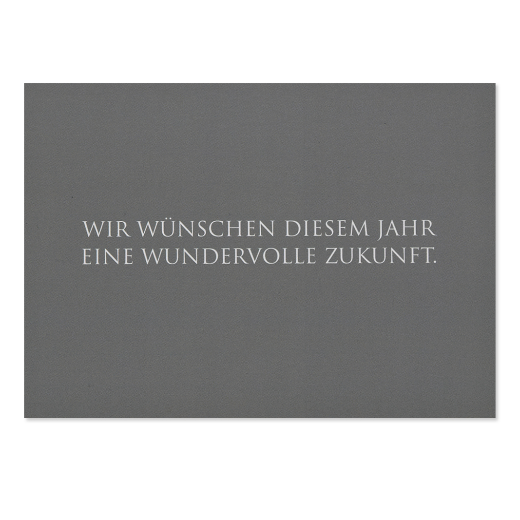 weihnachtskarte-wunderwort-wundervolle-zukunftt Graue Postkarte mit weissem Text: ...eine wundervolle Zukunft